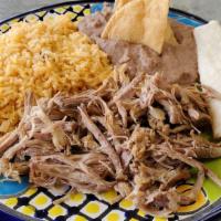 Pork Carnitas Plate · Served with rice, beans, salsa, onions and cilantro, and tortillas.