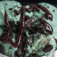Magnetic Mint Ice Cream · Mint and fudge ice cream with Oreo's and Andes mints in a waffle bowl