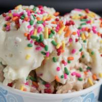 Birthday Cake Capacitor Ice Cream · Cake batter and fudge ice cream with cookie dough and sprinkles in a waffle bowl