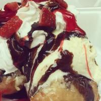 Fried Oreos · With vanilla ice cream fresh strawberry's chocolate sauce, powdered sugar, whip cream.
