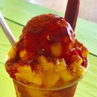 Pinada · Piña shaved ice and chamoy and lucas and fruit Pina as a topping