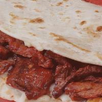 Gringa · Flour tortilla white melted cheese with your choice of meat: beef steak trompo style pork or...