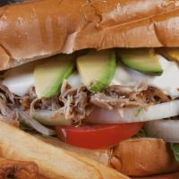 Torta De Pollo · Chicken avocado white melted cheese mayonnaise lettuce tomatoes onions fries.