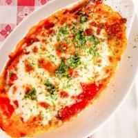 Nick'S Lasagna · Pasta layered with beef and mozzarella cheese. Topped with mozzarella cheese and marinara sa...