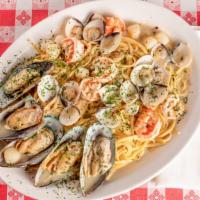 Linguine Tutto Mare · Mussels, shrimp, scallops, and baby clams sauteed in garlic butter sauce and served over lin...