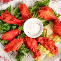 Chicken Wings (7) · buffalo style wings.  choose dipping sauce.