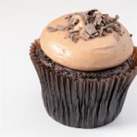 Choco-Holic · Chocolate cake topped with our chocolate buttercream and dark chocolate shavings.