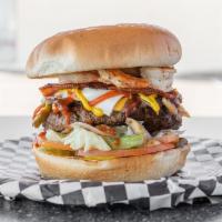 Supreme Cheeseburger · Sautéed onions, mushrooms, jalapenos, bell peppers, bacon, american and provolone cheese, ma...