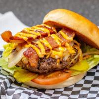 Thousand Island Burger · Bacon, grilled onions, cheddar cheese, thousand island dressing, lettuce, tomato and pickles.