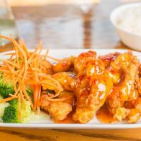 Orange Sesame Chicken · Deep-fried chicken, then stir-fried with orange sauce and bell pepper, pineapple, topped wit...