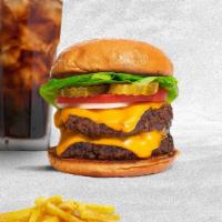 Baconator Double Cheese Burger · (Halal) Two American beef patties topped with melted cheese, turkey bacon, lettuce, tomato, ...