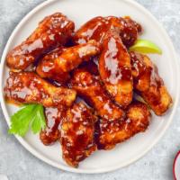 Bbq Boy Wings · (Halal) Fresh chicken wings fried until golden brown, and tossed in barbecue sauce.