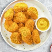 Chicky Nuggets · (Halal) Bite sized nuggets of chicken breaded and fried until golden brown. Twelve pieces.