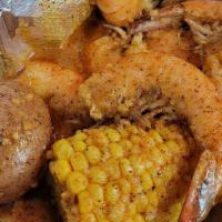 10 Boiled Shrimp · 1/2 lb of shrimp comes with one corn and one potato in our hand made sauce ask for spicy or ...