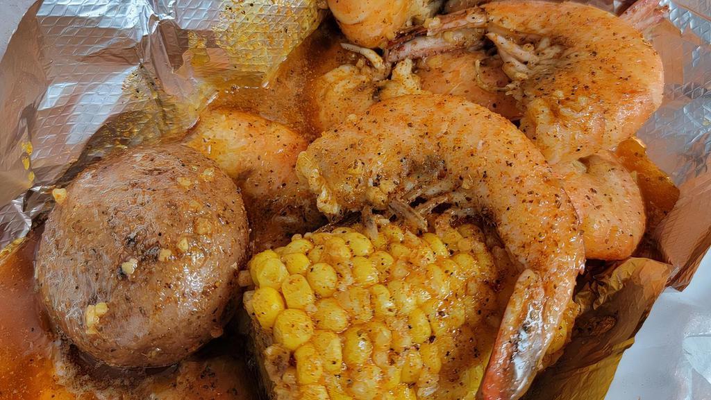 10 Boiled Shrimp · 1/2 lb of shrimp comes with one corn and one potato in our hand made sauce ask for spicy or mild