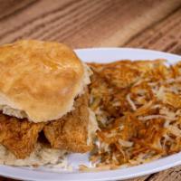 Country Fried Chicken Biscuit · Chicken fried chicken breast stuffed into one of our Texas size biscuits. Hash Browns or Gri...