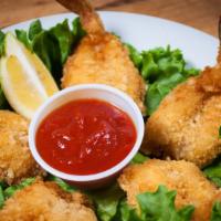 Appetizer Fried Shrimp · 5 of our hand breaded shrimp fried to golden perfection.