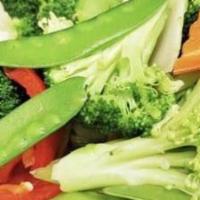 Vegetable Delight · Broccoli snow peas baby corn carrot mushroom zucchini and cabbage. vegetarian.