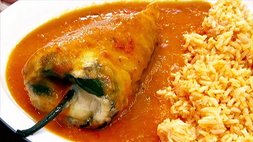 Chile Relleno · Green chile peppers stuffed with cheese dipped in fluffy egg batter & fried until golden brown