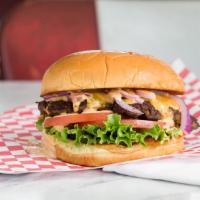 Cheeseburger · American, cheddar or Swiss cheese. Lettuce, tomato,pickles, onions with Killen's sauce.