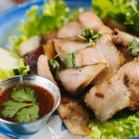 G9-Kor Moo Yaang · Our special grilled marinated pork, served with sticky rice.