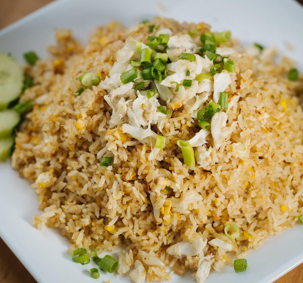 F3-Crab Fried Rice · Stir-fried real crab meat with steamed jasmine rice, egg, topped with green onions.