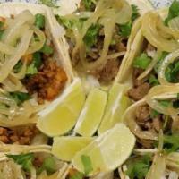 4 Tacos Con Arroz Y Frijoles · 
