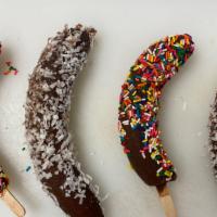 Chocobanana · Frozen chocolate-covered banana with coconut or sprinkles.