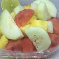 Fruit Bowl · Mixed seasonal fruits. Chamoy and chili powder on the side.