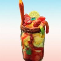 Fruti-Jar · Seasonal fruit with chamoy, assorted candy, and squirt soda.