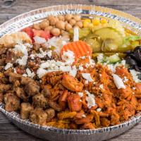 Combo Platter · Most popular. Chicken and lamb. Served with rice, lettuce, tomato, onion, cucumber, , (2) wh...