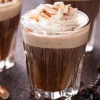 Espresso Con Panna · A double shot of rich espresso topped with whipped cream.