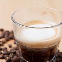 Iced Espresso · Rich and full bodied double espresso shot with the perfect amount of crema, poured over ice.