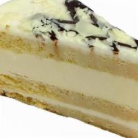 Tres Leches Cheesecake · Tres Leches Cheesecake is made with vanilla sponge cake infused with three types of milks, a...