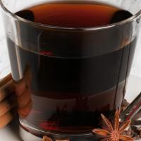 Hot Chai Tea · Hot black tea with cinnamon, cloves and chai spices.