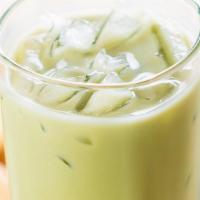 Iced Honey Matcha Latte · Honey flavored, herbal green tea mixed with ice cold, creamy milk.