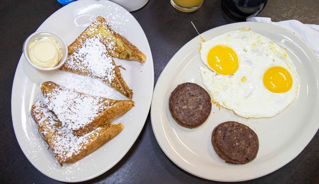 French Toast Combo · With 4 triangles, 2 eggs and choice of bacon or sausage.