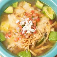 Tortilla Soup Bowl · Our homemade daily chicken & vegetable soup served with avocados, tortilla strips & Monterey...