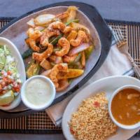 Shrimp Fajitas · Grilled shrimp with grilled vegetables and our signature butter.
