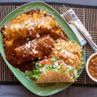 Plato De Jamie
 · Your choice of one enchilada, taco and tamale – create the way you want it