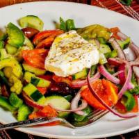 Village Salad · Roma tomato | red onion | cucumber | Kalamata olive | olive oil | house red wine vinaigrette...