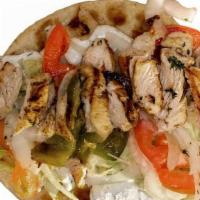 Chicken Souvlaki Pita · marinated, flame-broiled chicken breast | onions | tomatoes | lettuce | tzatziki