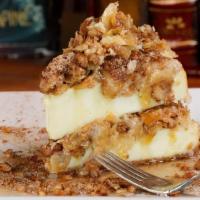 Baklava Cheesecake · double layered cheesecake and baklava | drizzled. with honey | topped with spiced, crushed w...