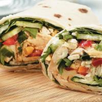 Chicken Salad Wrap · White chicken salad with diced celery and carrots in a spinach flour tortilla.