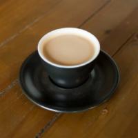 Café Con Leche (6 Oz) · Our small, strong, and sweet Café Con Leche is served Puerto Rican style with two shots of e...