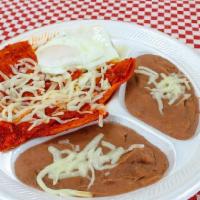 Chilaquiles Rojos · Tortilla banada en salsa roja, acompanada con 1 huevo frito o revuelto, frijoles, y crema.
F...