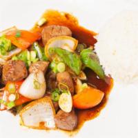 Shaking Beef · Beef tenderloin cubes sautéed with bell peppers, onion, and scallions served with jasmine ri...