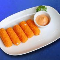 Mozzarella Cheese Sticks (8 Pcs) · Golden deep-fried breaded mozzarella sticks served with tomato ketchup or marinara sauce.