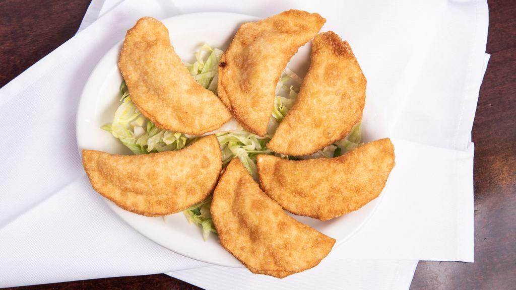 Crab Rangoons (6) · Fried wonton wrapper filled with crab and cream cheese.