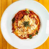 Deconstructed Lasagna · House noodles, sausage, beef, spinach marinara, ricotta, mozzarella, parmesan mix